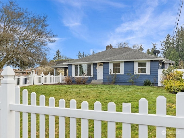 view of front of property with a front lawn