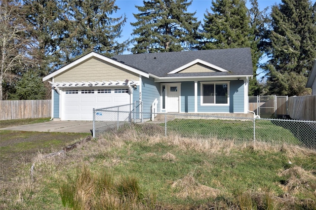 ranch-style house with a garage, driveway, a fenced front yard, and roof with shingles