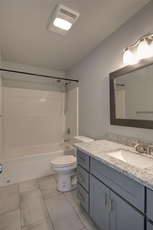 full bath featuring bathtub / shower combination, visible vents, toilet, vanity, and tile patterned floors