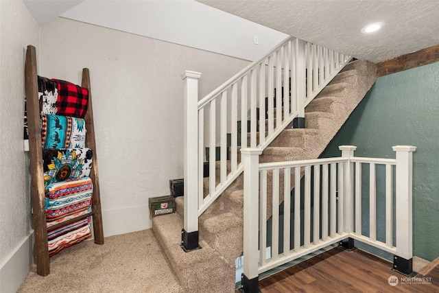 staircase with carpet