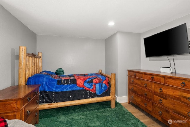 bedroom with light wood-type flooring