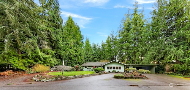 view of front of home with a carport