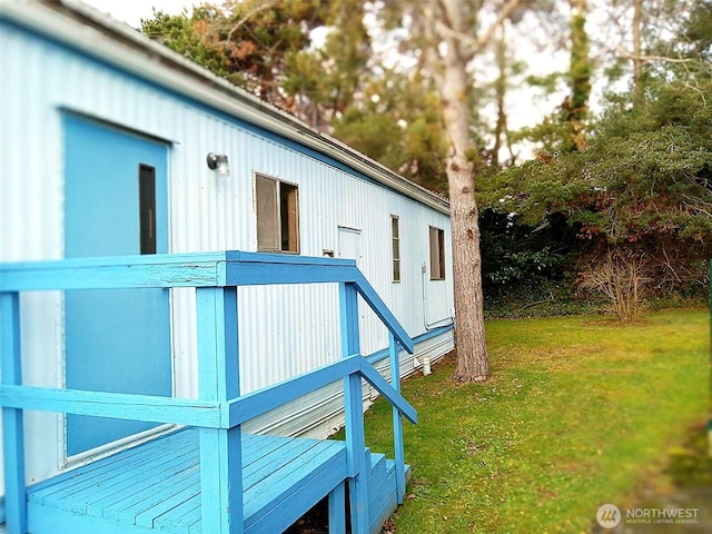 view of home's exterior featuring a yard