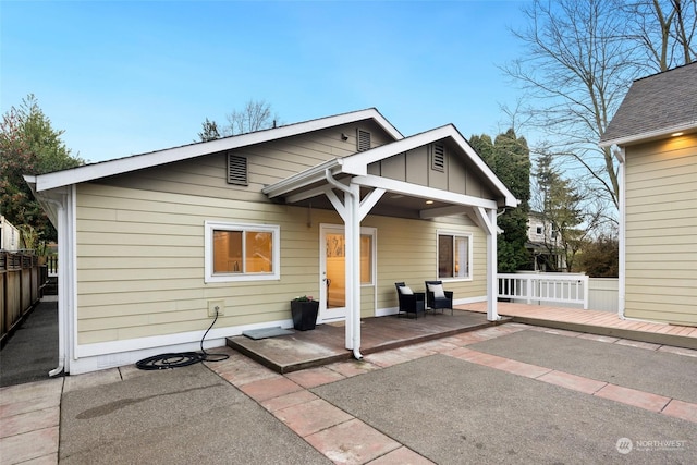 back of house with a patio area