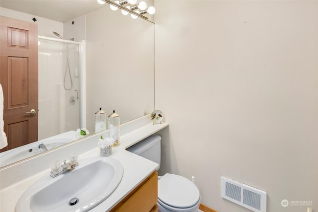 bathroom with toilet, a shower with door, and vanity