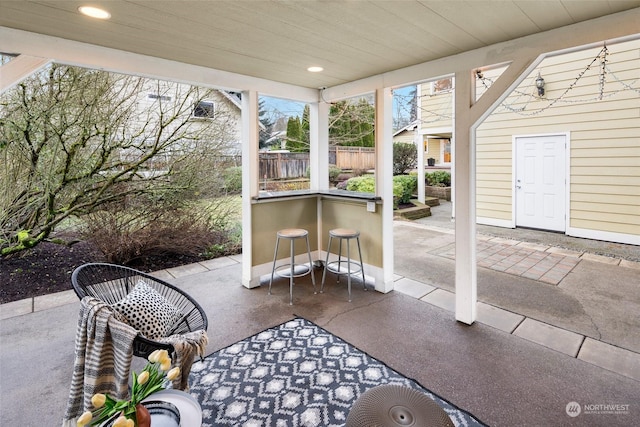 view of patio / terrace featuring an outdoor bar