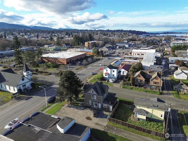 drone / aerial view featuring a mountain view