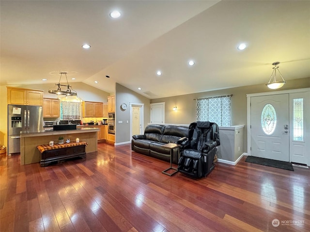 living room with lofted ceiling and dark wood-type flooring