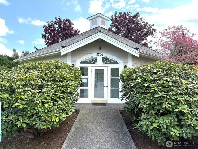 2700 Old Fairhaven Pkwy Unit 2D, Bellingham, WA 98225 - doorway to property with roof with shingles