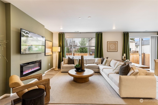 living room featuring light wood-type flooring