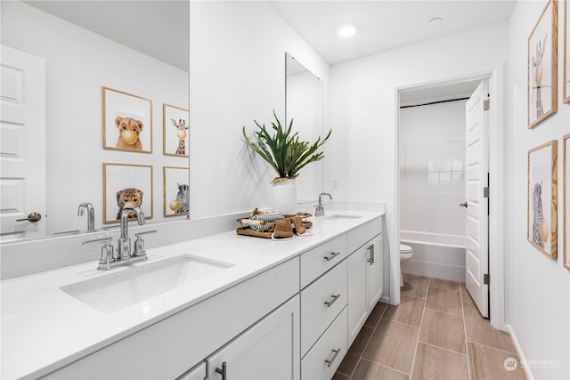 full bathroom with vanity, tile patterned flooring, shower / bathtub combination, and toilet