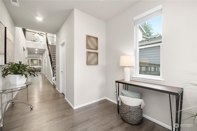 hallway featuring hardwood / wood-style flooring