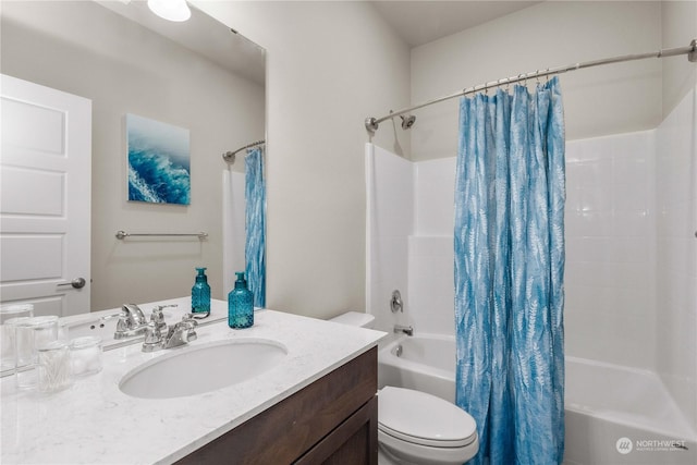 full bathroom with toilet, shower / tub combo, and vanity