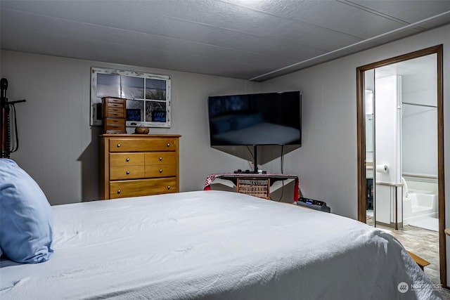 bedroom featuring ensuite bathroom