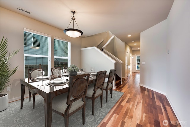 dining area featuring hardwood / wood-style floors