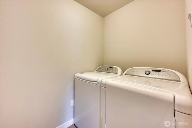 laundry room with washer and dryer