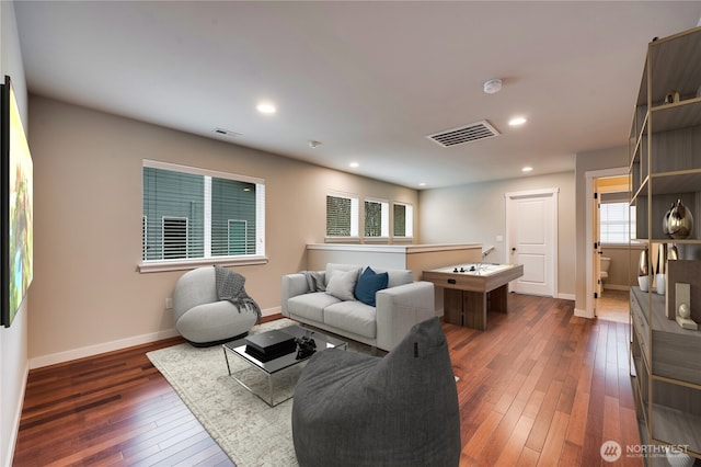 living room featuring dark hardwood / wood-style flooring