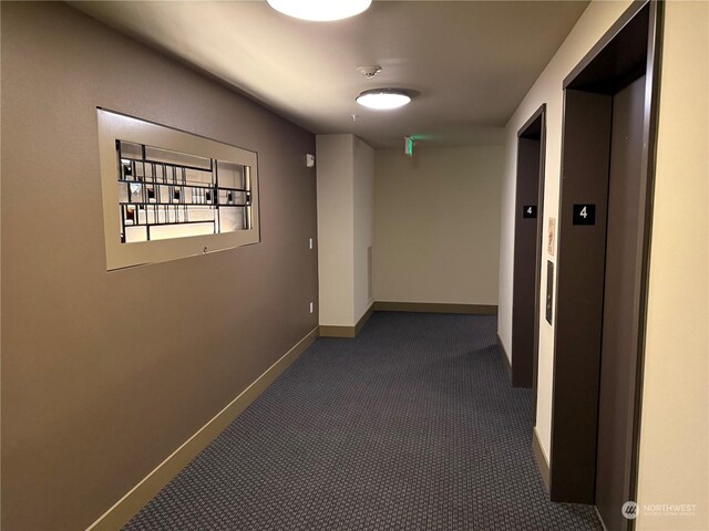 corridor featuring elevator