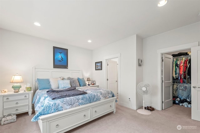 carpeted bedroom featuring a closet