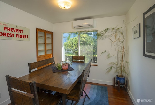 dining room with a wall mounted AC and dark hardwood / wood-style floors