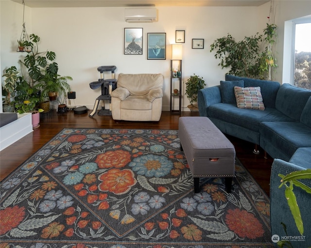 living room featuring a wall unit AC and dark wood-type flooring