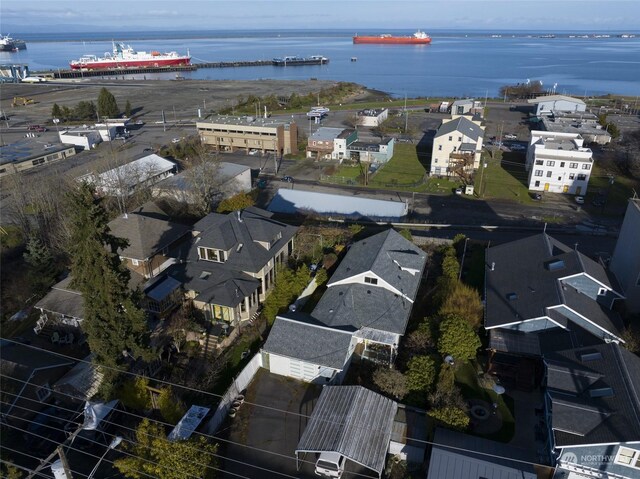 birds eye view of property featuring a water view