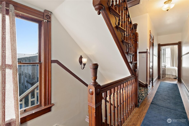 staircase featuring hardwood / wood-style flooring