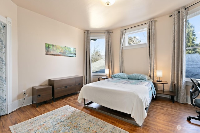 bedroom featuring hardwood / wood-style floors