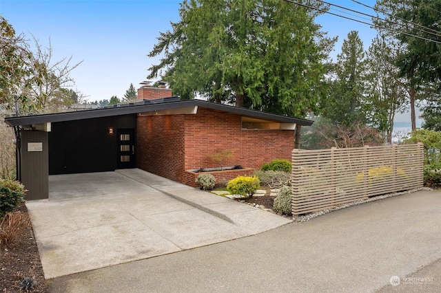 view of front of home featuring a carport