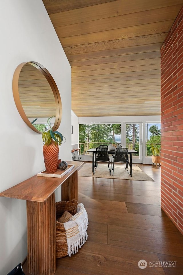 corridor with wood ceiling and hardwood / wood-style floors