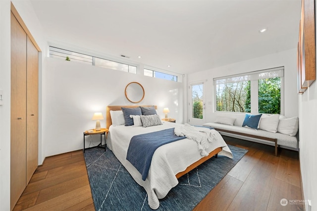 bedroom featuring a closet and hardwood / wood-style flooring