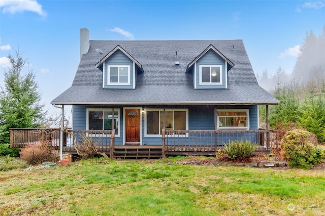 cape cod-style house with a porch and a front yard