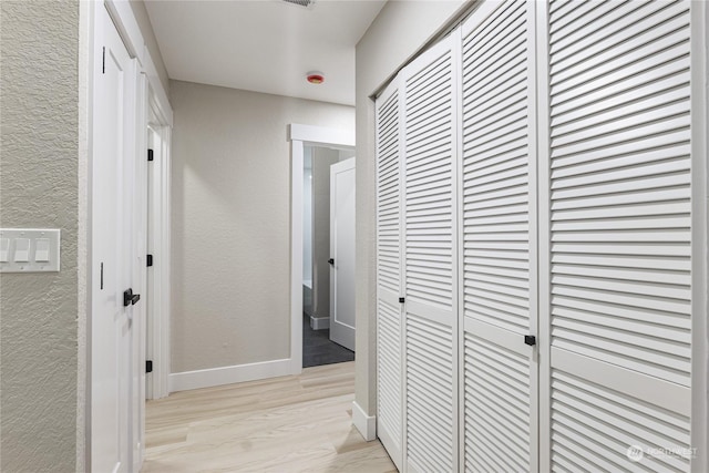 hallway featuring light hardwood / wood-style floors