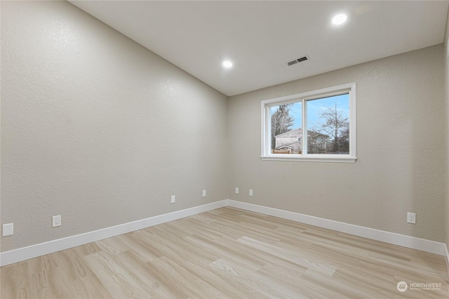 empty room featuring light hardwood / wood-style flooring