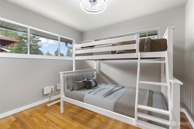 bedroom with wood-type flooring