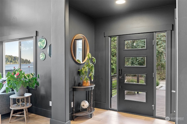 entrance foyer with light wood-type flooring