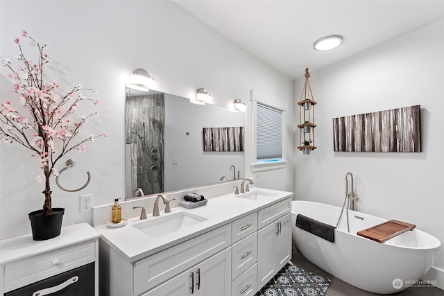 bathroom featuring tile patterned flooring, separate shower and tub, and vanity