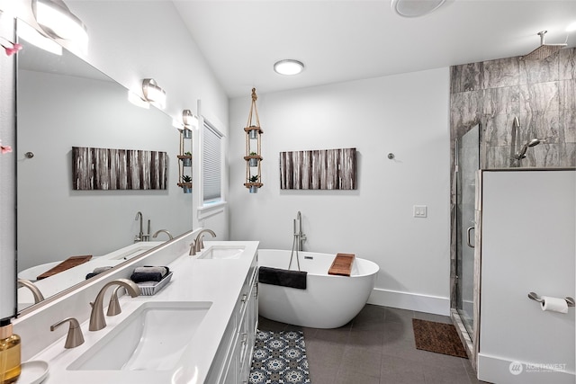 bathroom featuring separate shower and tub, vanity, and tile patterned flooring