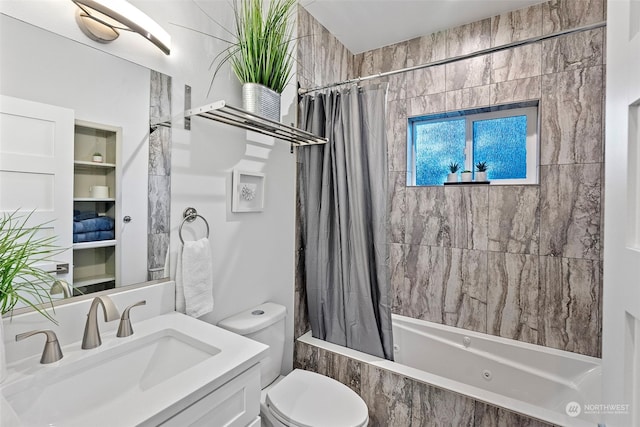 full bathroom featuring toilet, vanity, and shower / tub combo with curtain