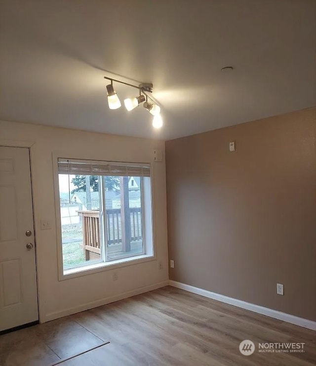 empty room featuring light hardwood / wood-style floors
