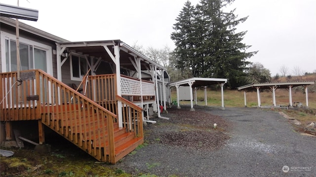 exterior space with a carport