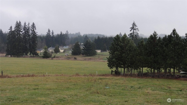 exterior space with a rural view