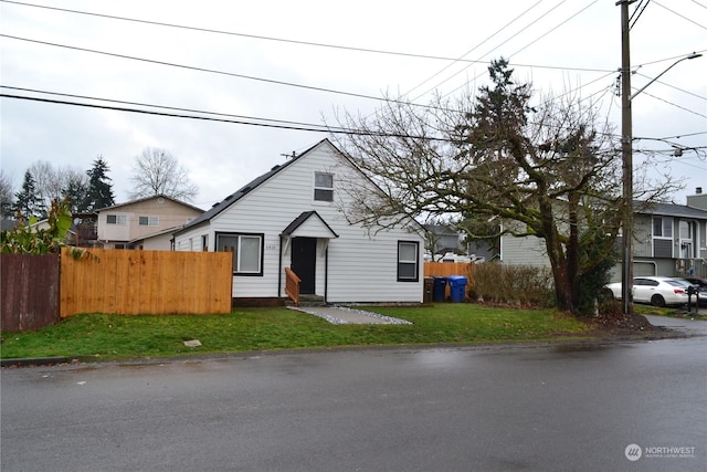 view of front of home with a front yard