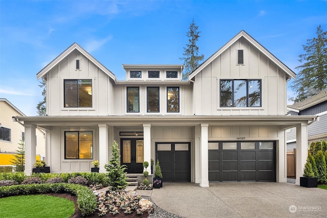 modern farmhouse style home featuring a garage