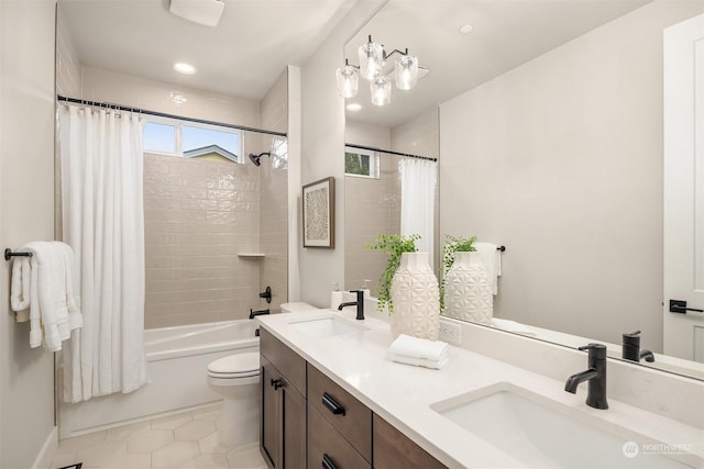 full bathroom with toilet, vanity, tile patterned floors, and shower / bathtub combination with curtain