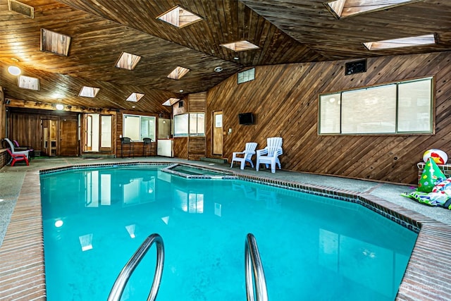 view of pool with a skylight