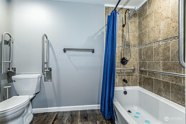 bathroom featuring shower / tub combo, toilet, and hardwood / wood-style flooring