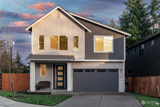 view of front facade featuring a garage and a porch