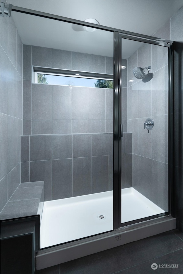 bathroom with a stall shower