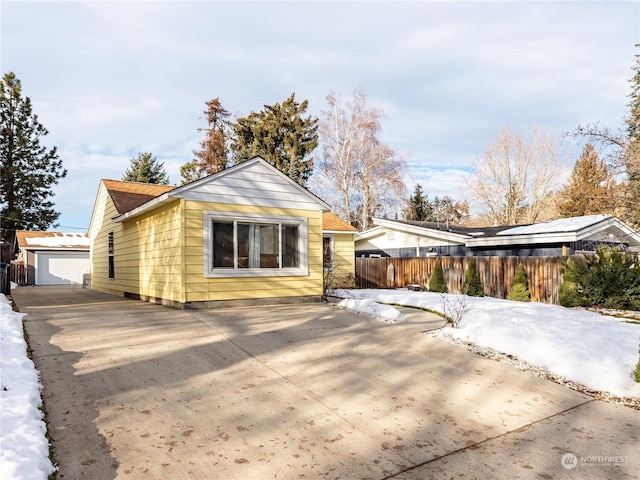 view of side of property featuring a garage